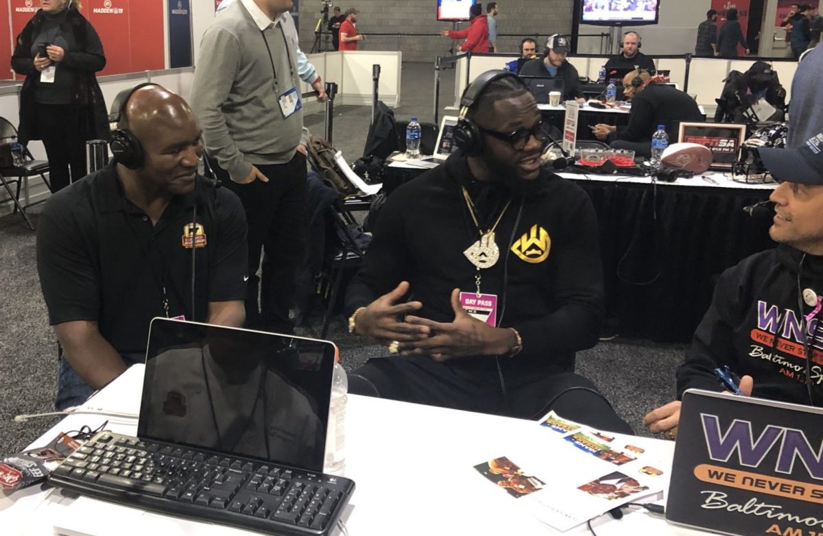 Evander Holyfield and Deontay Wilder collide with Nestor on Radio Row in Atlanta for Super Bowl LIII
