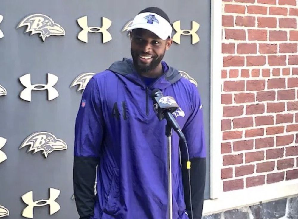 The unmistakable purple air of Harbaugh around Minter